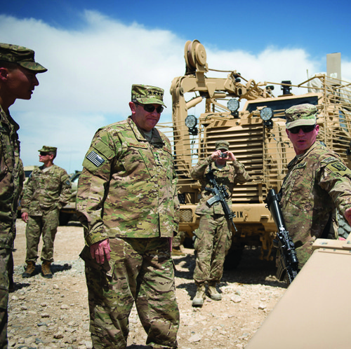 Gen. Philip Breedlove (third from left), Supreme Allied Commander Europe, receives details about armed road clearance operations in Mazar-e-Sharif, Afghanistan.